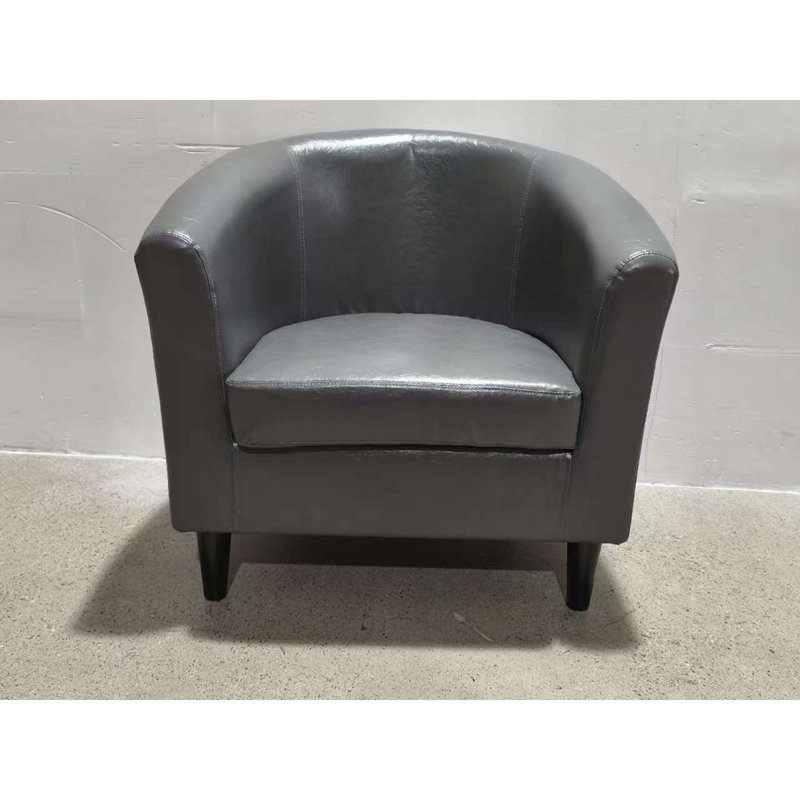 Fauteuil demi-tonneau luxueux en similicuir avec repose-pieds