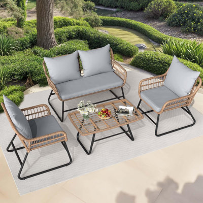 Ensemble de 4 canapés modulaires en rotin pour l'extérieur avec causeuse en rotin et table en verre trempé avec coussins Parfait pour le porche de jardin