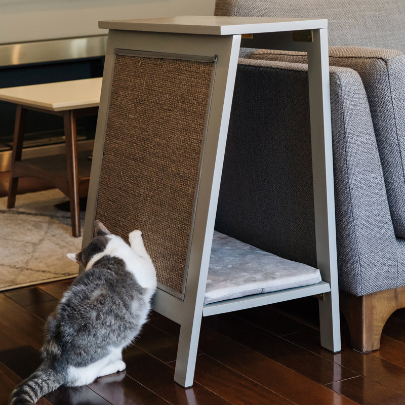 Lit pour chat en forme de A, Fumée