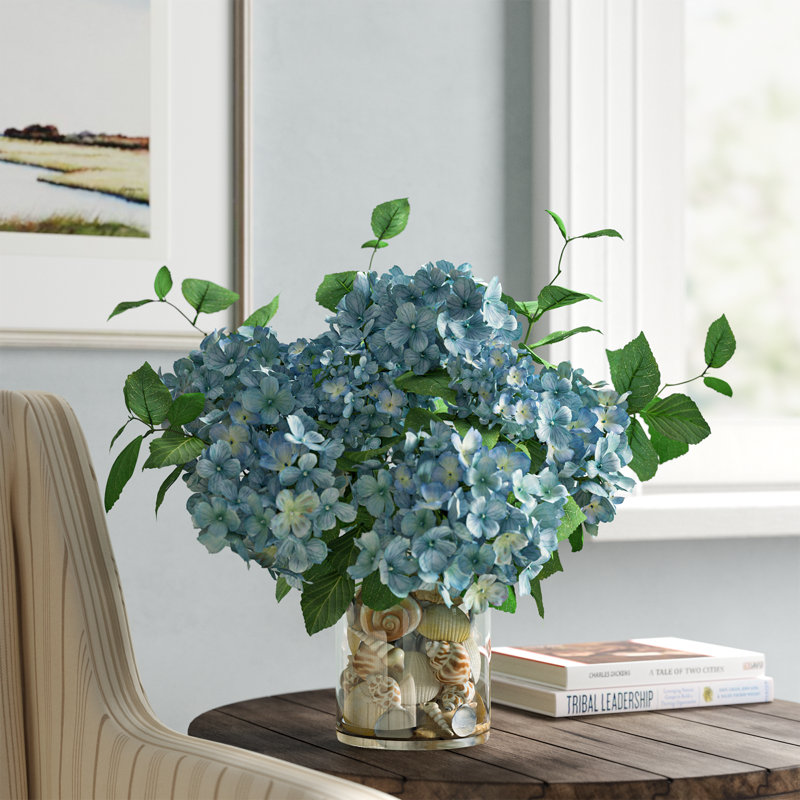 Hydrangeas Arranged in Glass Vase with Shells, Blue/Beige