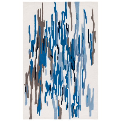 Tapis bleu / ivoire en laine / coton touffeté à la main Rodeo Drive