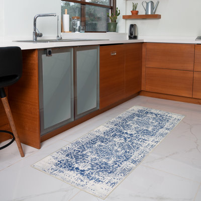 Tapis lavable à la machine avec envers antidérapant à motif floral moderne abstrait bleu marine et crème