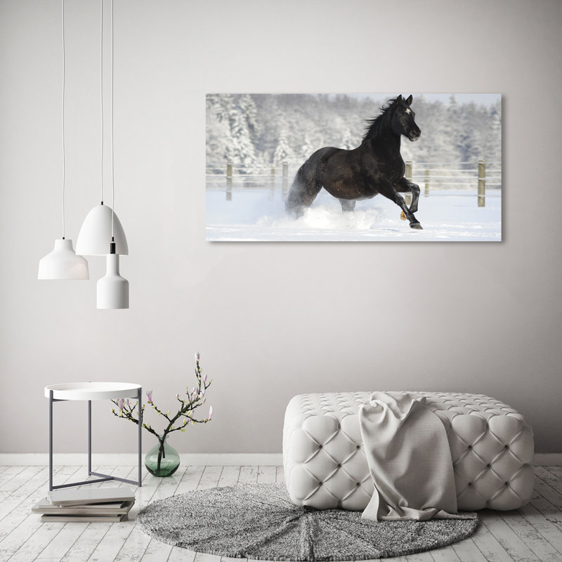 A Horse Galloping In The Snow - Wrapped Canvas Print