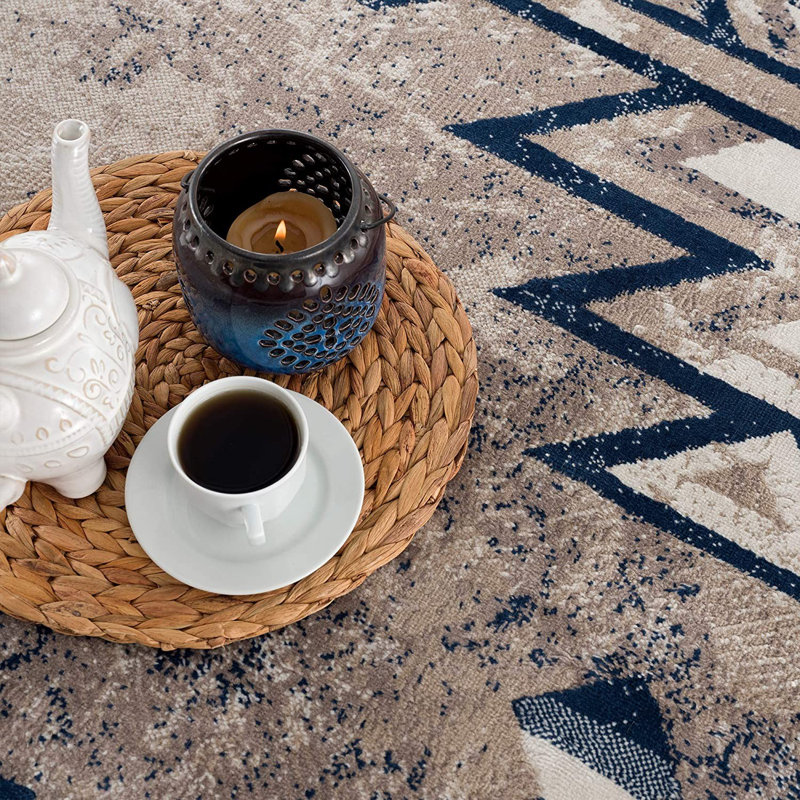 Aubreauna Area Rug in Beige