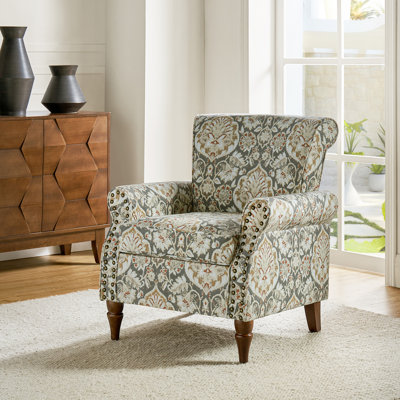Fauteuil Asul avec garniture cloutée