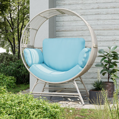 Fauteuil pour patio en osier avec coussin