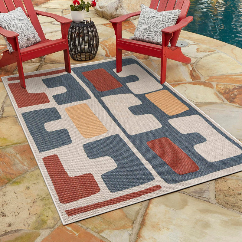 Tapis intérieur / extérieur en polypropylène tissé à la machine Dreson de couleur turquoise / beige / orange