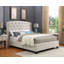 Lit tapissier à oreilles capitonné en tissu avec garniture cloutée