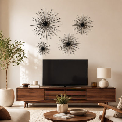 Ensemble de 4 décorations murales en métal Starburst avec finition noire 3D