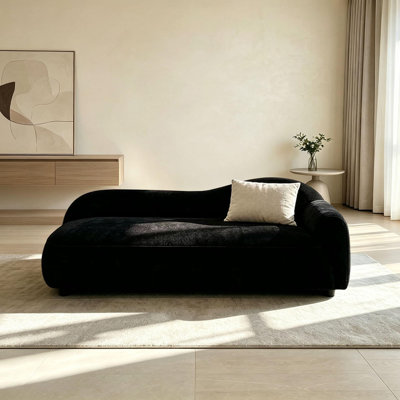 Minimalist black fabric chaise lounge