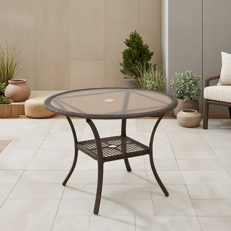 Table d'extérieur en rotin avec plateau et pieds en verre trempé