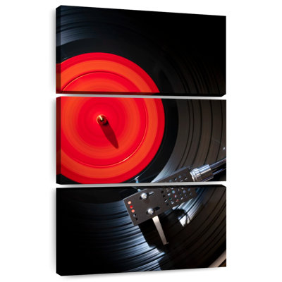 Abarca Playing Vinyl