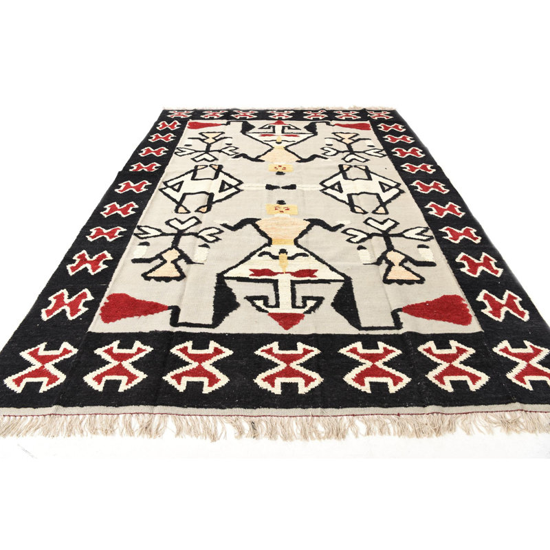 Tapis noir Iniguez