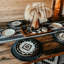 Service de table 16 pièces en céramique à motif aztèque crème / noir / taupe Chalet