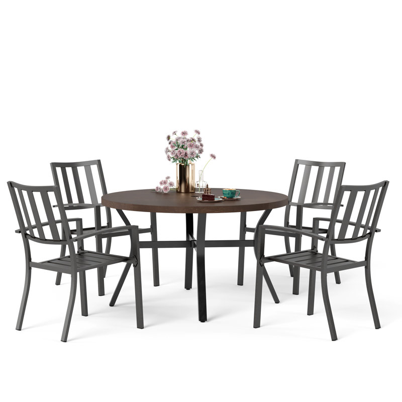 Armisha 4 - Person Patio Dining Set with Round Table