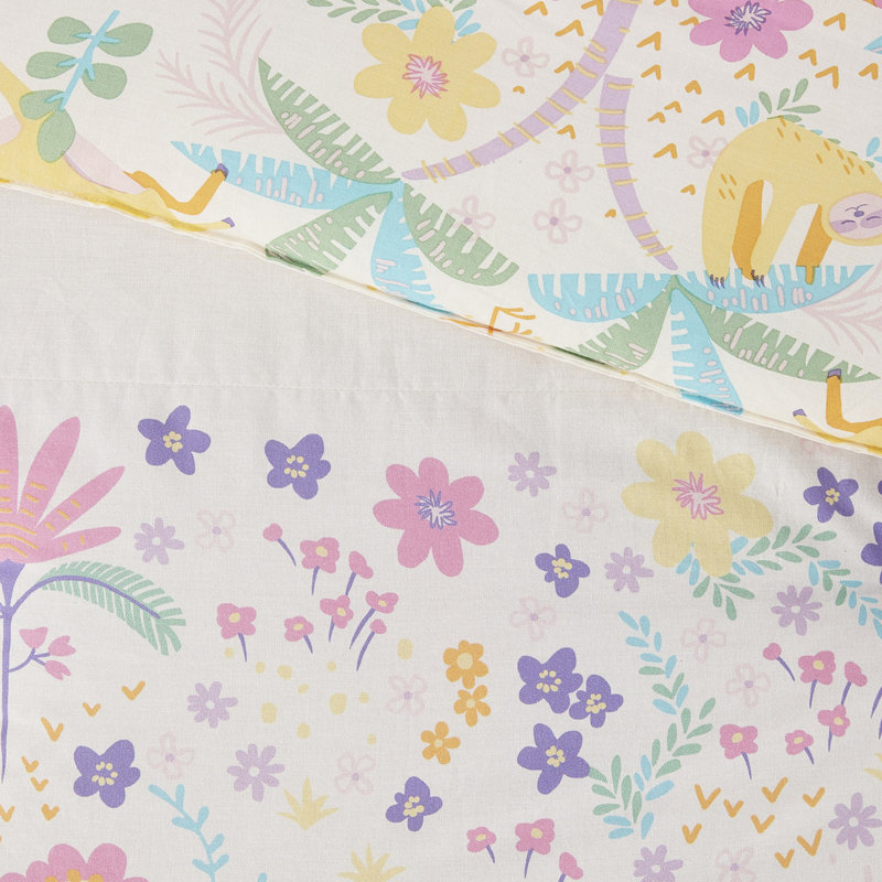 Housse de couette simple avec fonction réversible et motifs floraux en coton colorés et coussin rond