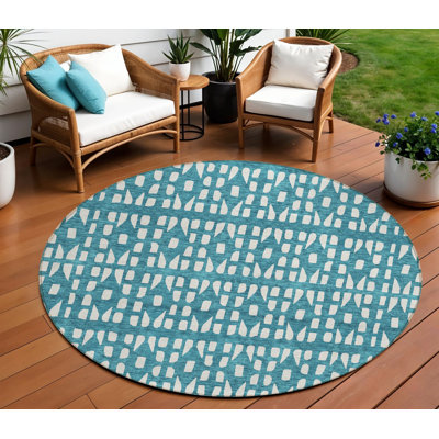 Tapis intérieur / extérieur rond 8 pi bleu sarcelle et ivoire