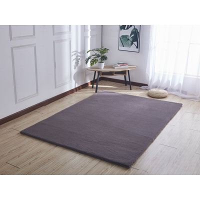 Tapis touffeté gris