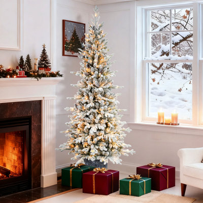 Pre-Lit Potted Flocked Arctic Fir Artificial Christmas Tree.