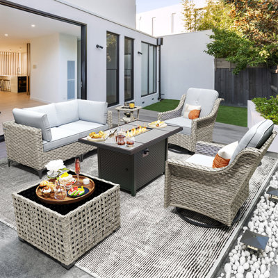 Emroy 7 - Piece Outdoor Wicker Sectional Seating Group with Cushions