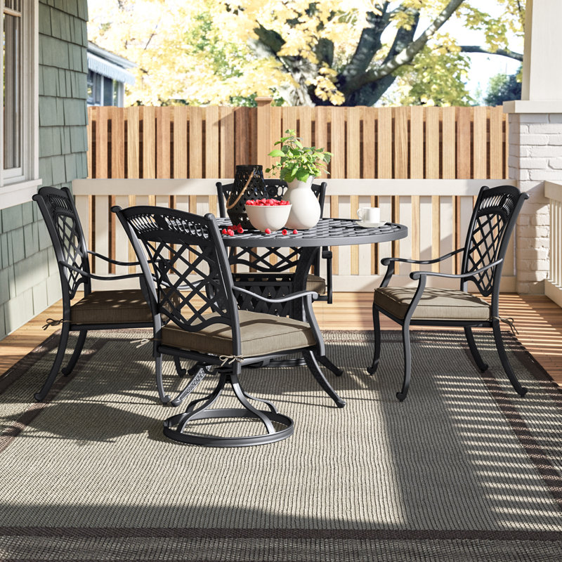 Wildermuth 4 - Person Patio Dining Set with Round Table , Sunbrella® Cushions Included