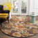 Emrick Blossom Hand Hooked Wool/Cotton/Latex Floral Rug in Brown