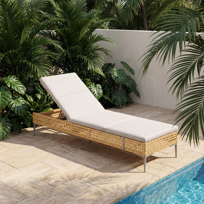 Chaise longue d'extérieur en osier avec coussins