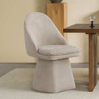 Chaise rembourrée pivotante en tissu Lomena