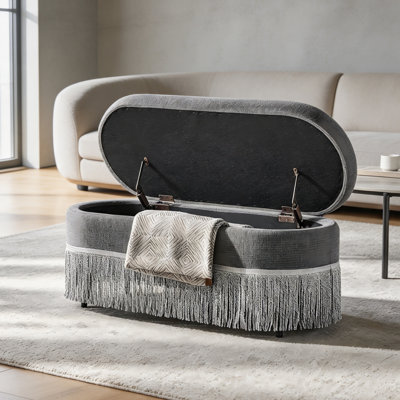 Repose-pieds ovale rembourré avec rangement à franges et couvercle relevable - L 39 po x l 16 po x H 17 po, repose-pieds multifonctionnel et rangement caché pour le salon ou la chambre à coucher - Tissu gris avec structure en métal