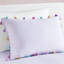 Literie lavande avec édredon à pampille élégant et coussin décoratif adorable avec pampilles décoratives