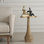 Table d'appoint en laiton Nykiah