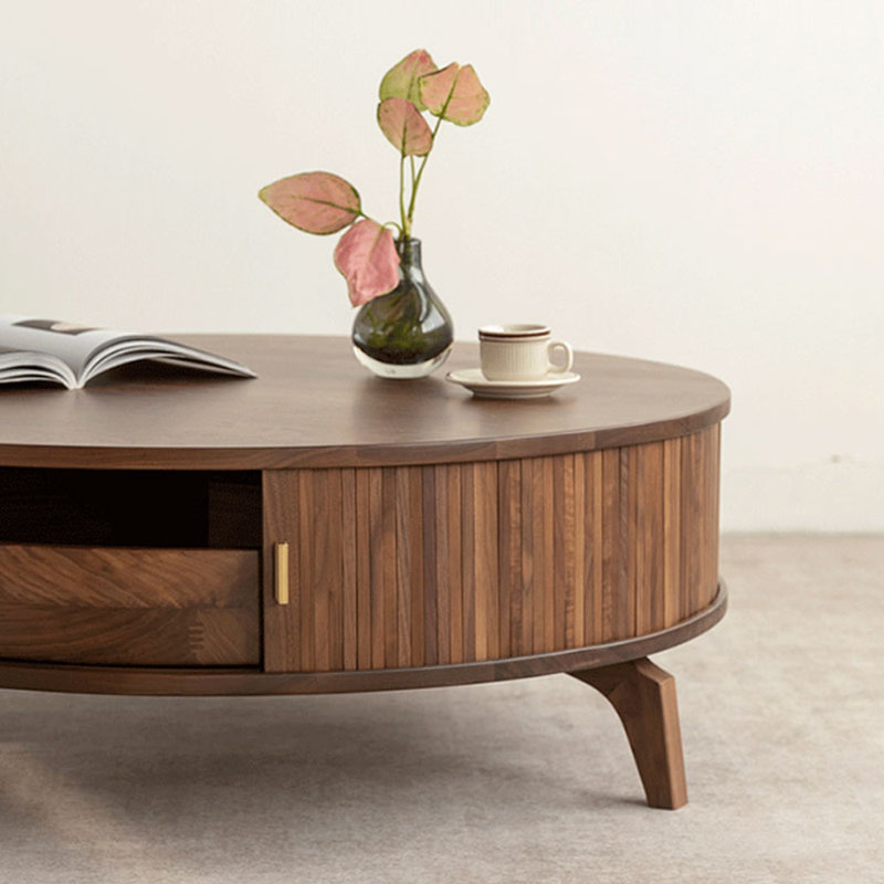 Table basse ronde avec porte roulante