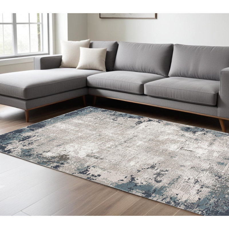 8' x 11' Blue and Ivory Abstract Power Loom Area Rug, Rectangle 7' x 10'