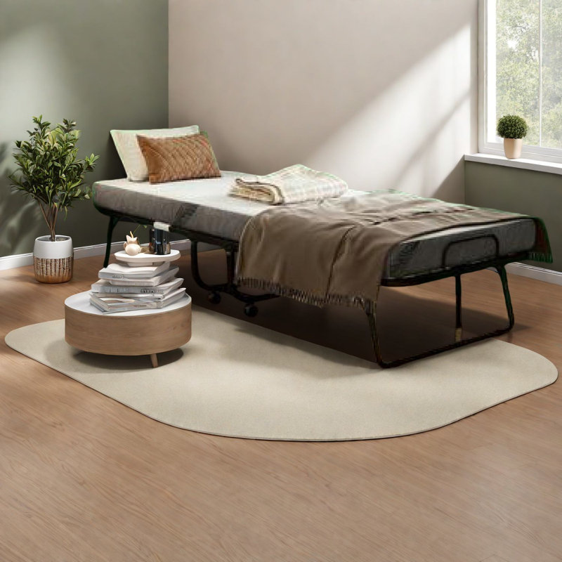 Lit pliant portatif peu encombrant, structure en acier avec mousse à mémoire de forme, idéal pour les espaces de vie modernes