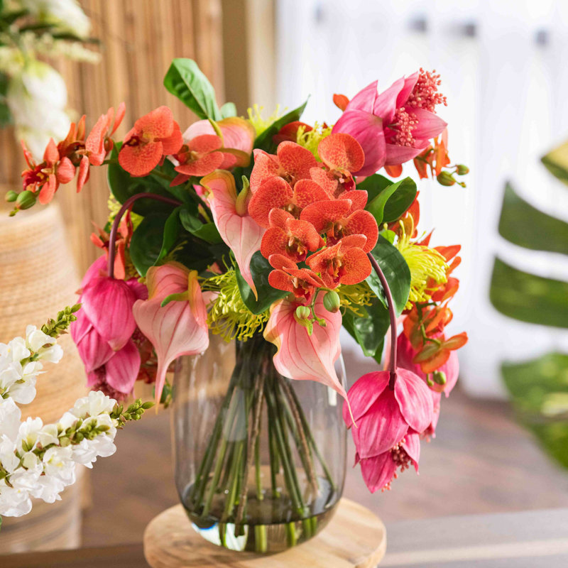 Isle of Magnifica Orchid Floral Arrangements in Vase