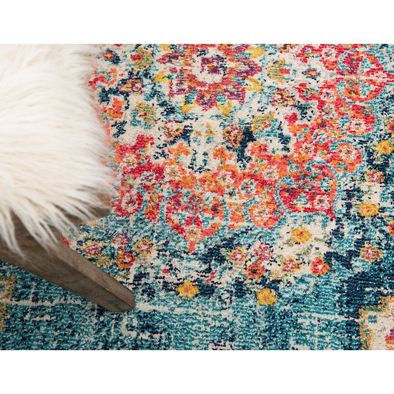 Tapis oriental bleu / rouge / jaune en polypropylène tissé à la machine Pennylane, Rond 4 pi 1 po