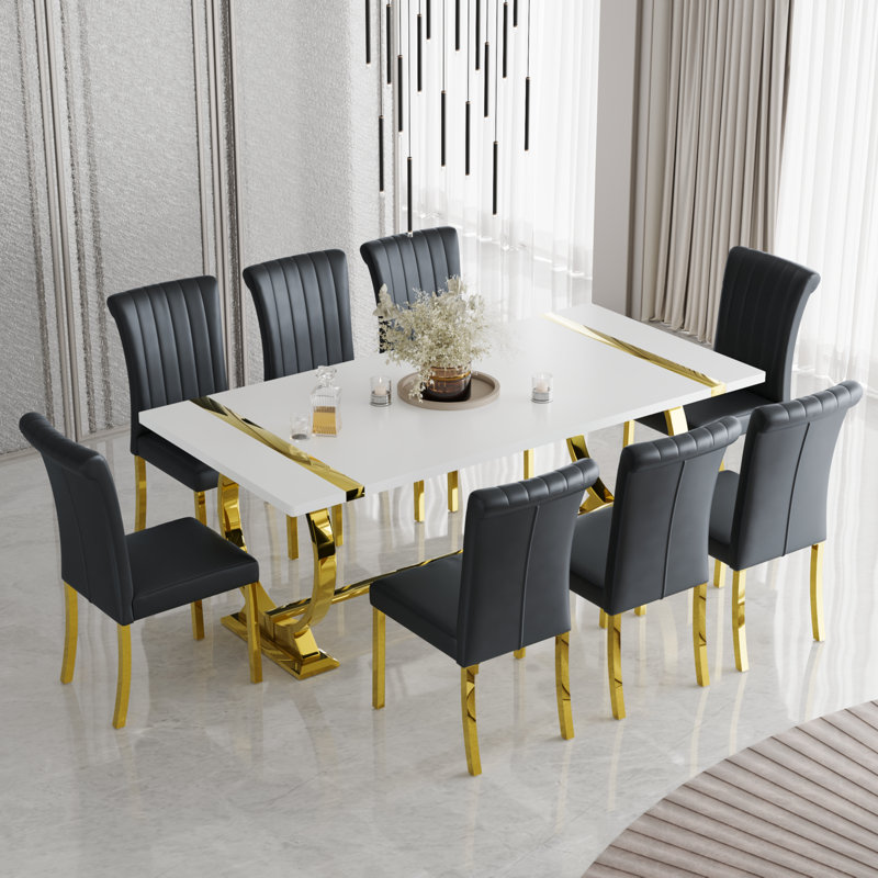 Ensemble de 8 chaises de salle à manger en cuir noir avec pieds dorés en miroir
