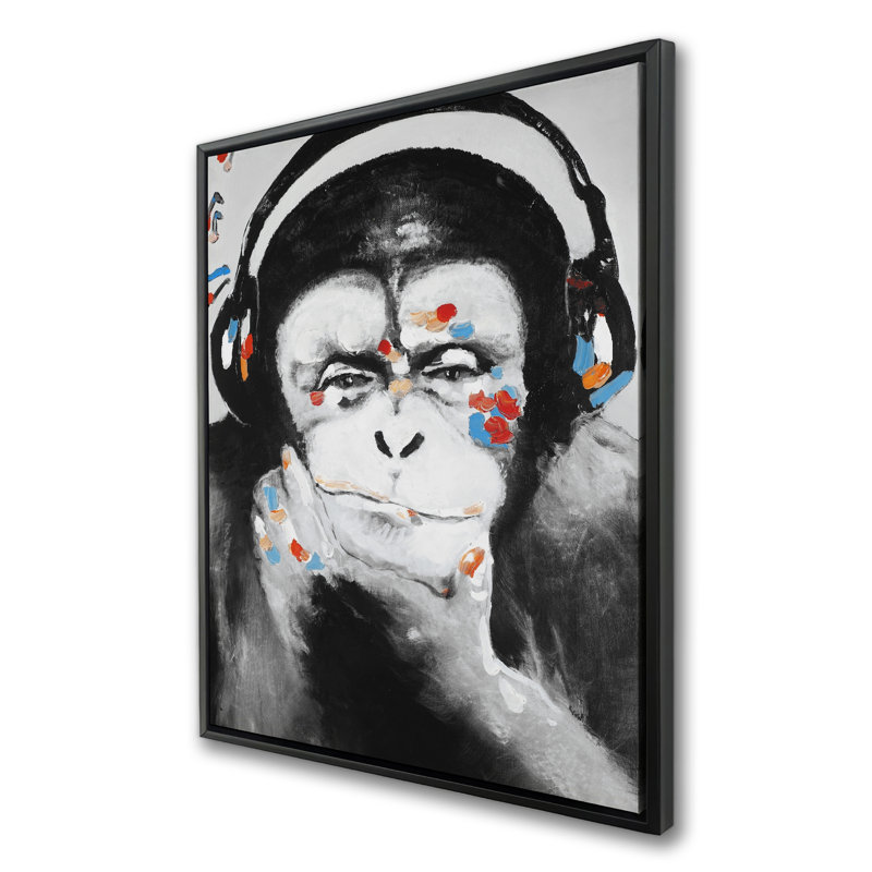 Art sur toile avec un singe avec un casque - faune noire