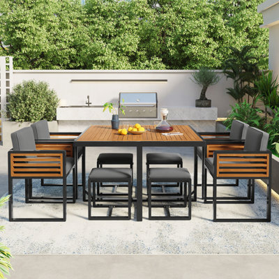 Ensemble de salle à manger 9 pièces en bois d'acacia, ensemble de patio extérieur peu encombrant, 4 chaises rembourrées, 4 repose-pieds et 1 table carrée pour la cour, le jardin, la terrasse et la piscine, gris