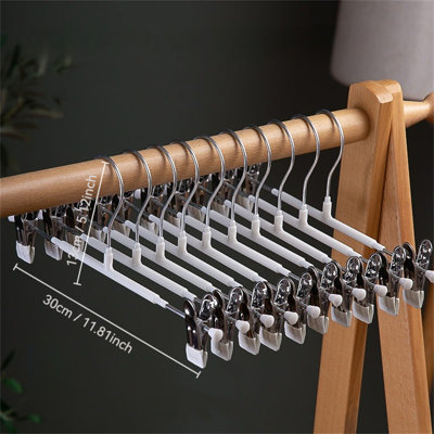 Cintre avec pinces pour pantalons