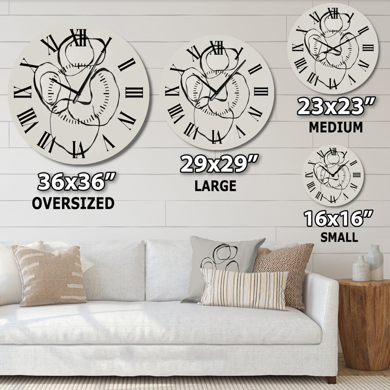 Horloge murale abstraite en métal, Petit