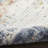Wrought Studio™ Motion 5'3" x 7' Blue Multicolor Modern Indoor Rug