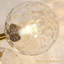 Luminaire pour meuble-lavabo 5 lumières, globe doré brossé