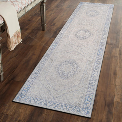 Tapis bleu tissé à plat lavable Valora avec envers antidérapant
