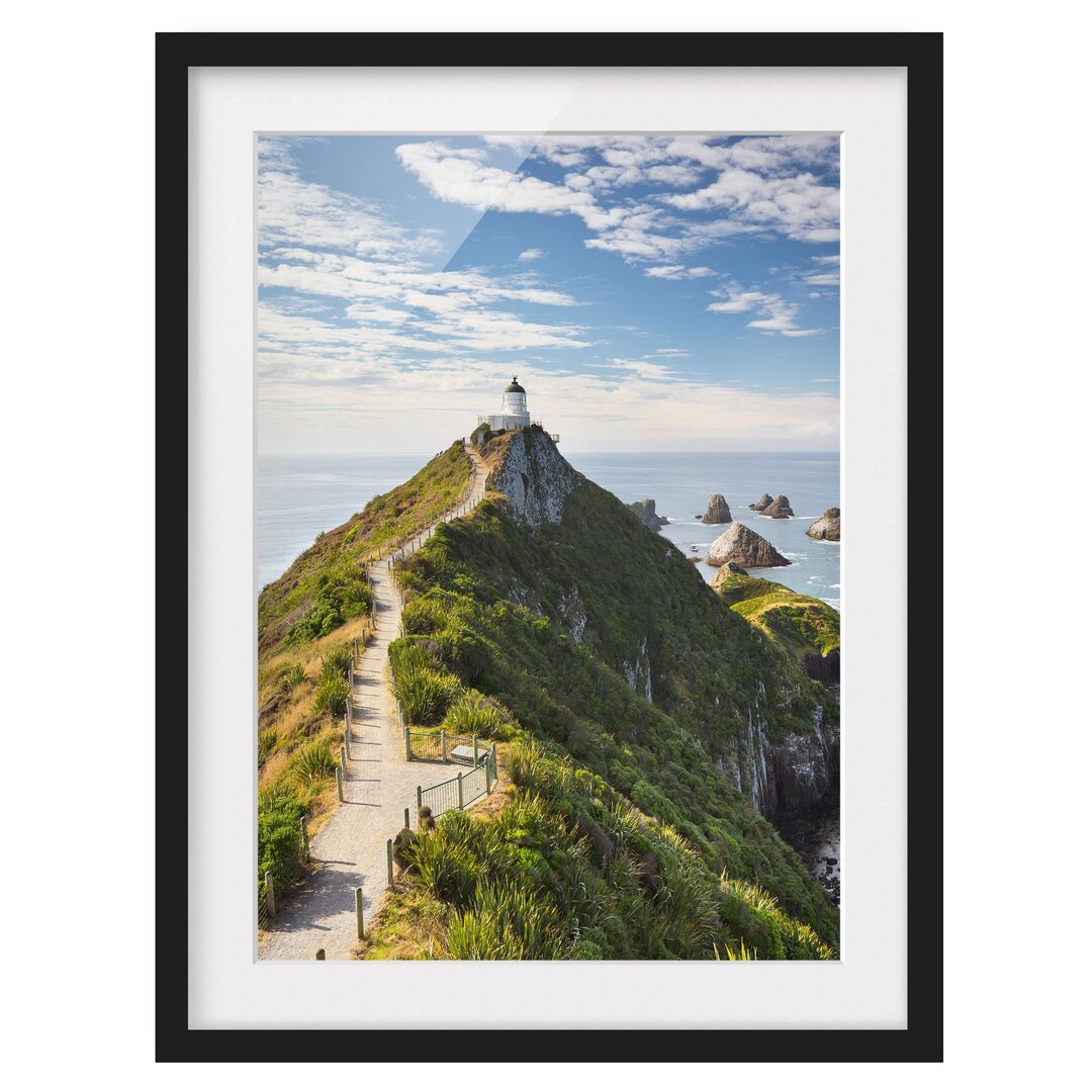 Gerahmtes Papierbild Nugget Point Leuchtturm und Meer Neuseeland