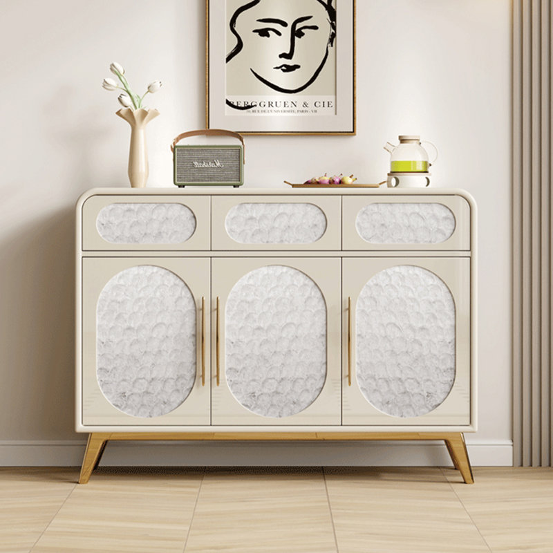 Cabinet With Shell Pattern Doors