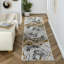 Tapis abstrait en polypropylène doré / gris Iksha-221219823