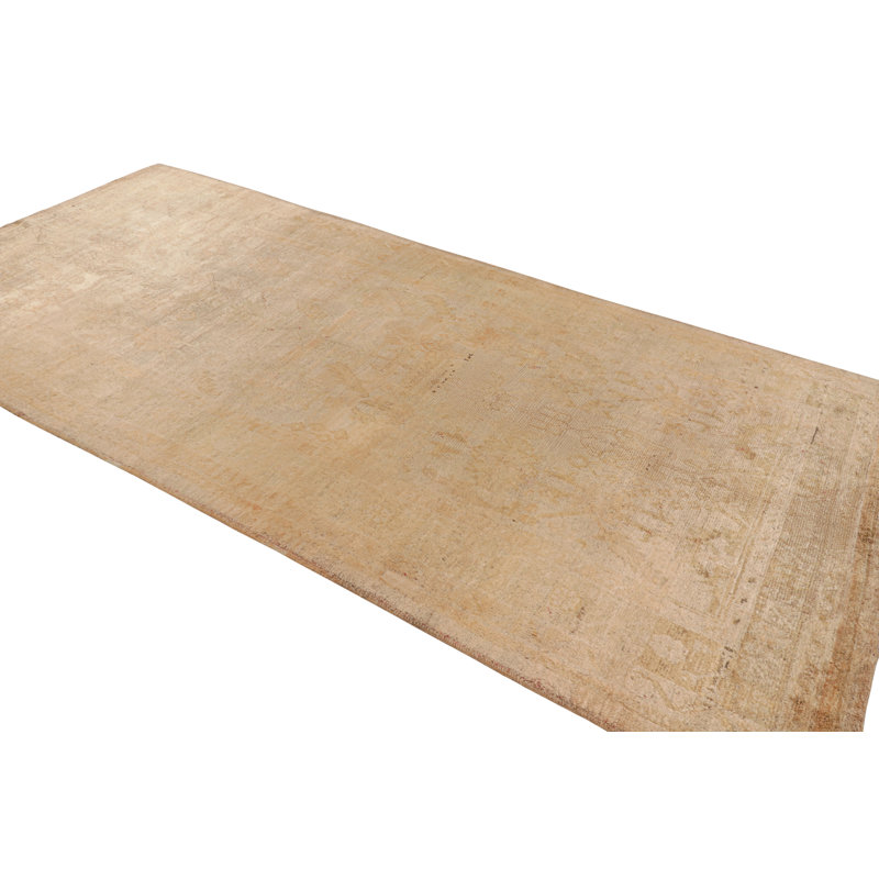 Hand Knotted Wool Area Rug in Cream