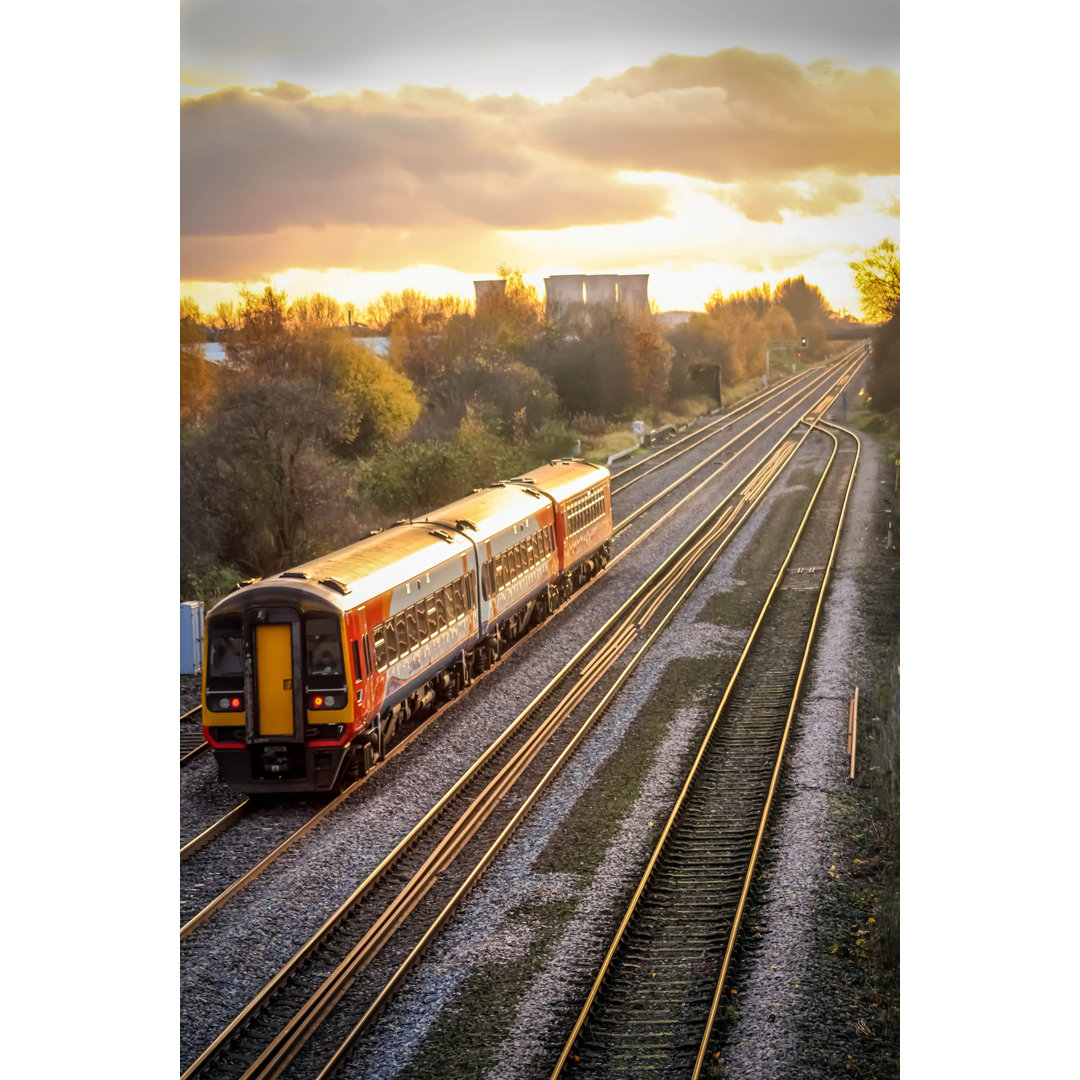 Leinwandbild Train At Sunset