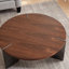 Table basse ronde au fini noyer - structure en métal noir, élégante pour un usage domestique brun foncé avec plateau et cadre